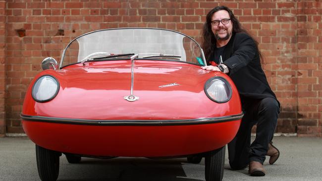 Curator Damian McDonald with a 1959 Goggomobil Dart minicar. Picture: Justin Lloyd.