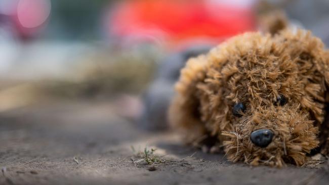 A weathered stuffed animal is seen at a memorial in front of Robb Elementary School. Picture: AFP