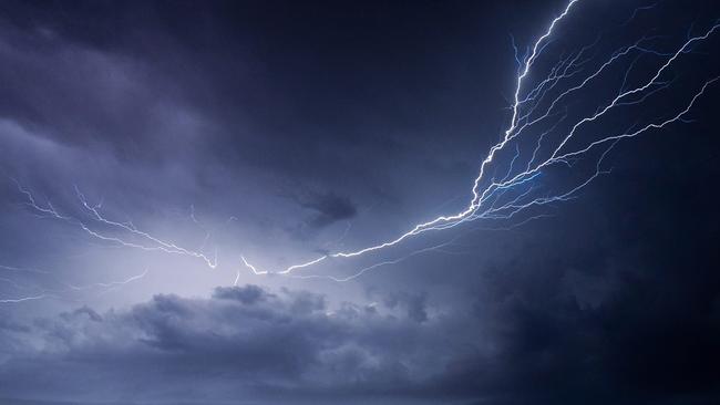 A woman in her 50s has had a lucky escape in the Mary Valley after a near-miss with a lightning strike.