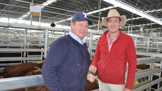 Nice return: Mylora’s Angus Graham, pictured with Elders agent Oliver Mason, Goulburn, sold 300 Poll Hereford steers and heifers at Yass. Picture: Nicola Bell