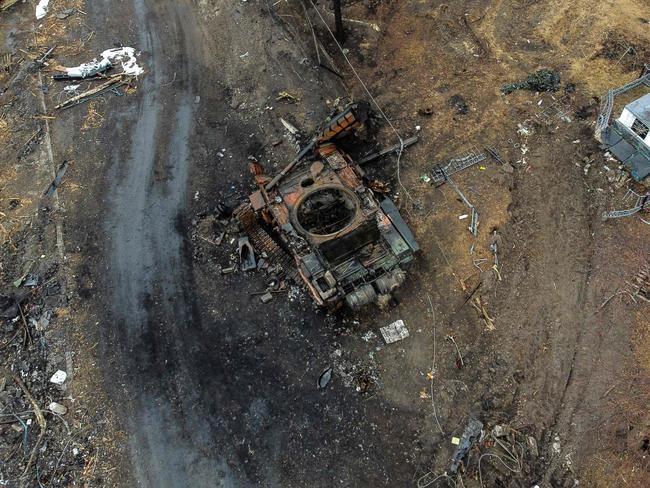 The aerial view taken near Kyiv on March 30, 2022 shows a destroyed Russian tank in the village of Lukianivka. Picture: Ronaldo Schemidt / AFP