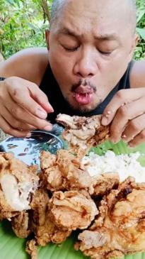 Food vlogger dies after devouring piles of fried chicken