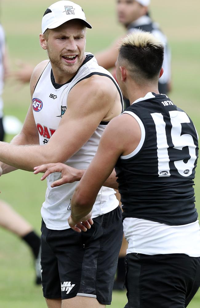 Billy Frampton and Aidyn Johnson have words after a clash at training. Picture: Sarah Reed.