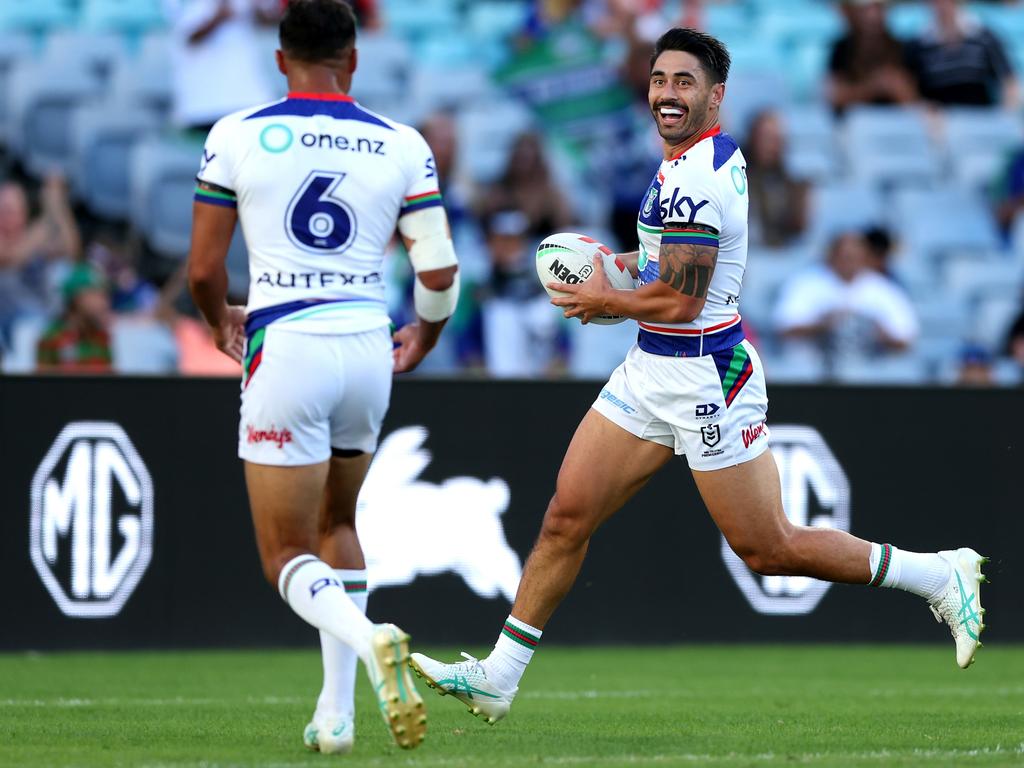 Shaun Johnson celebrates a try for the Warriors. Picture: Mark Metcalfe/Getty Images