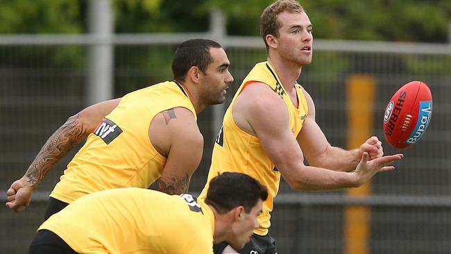 Tom Mitchell at Hawks training with Shaun Burgoyne and Jaeger O'Meara. Picture: Wayne Ludbey