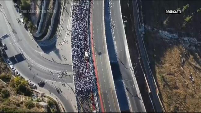 Thousands march to Israel’s Parliament