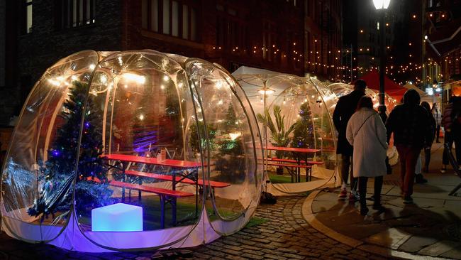 Social distancing bubble tents for dining are seen amid the Coronavirus pandemic in New York, December 2020. Picture: Angela Weiss/AFP