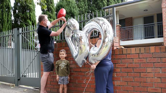 Wellwishers leave balloons outside her home following news of her resignation
