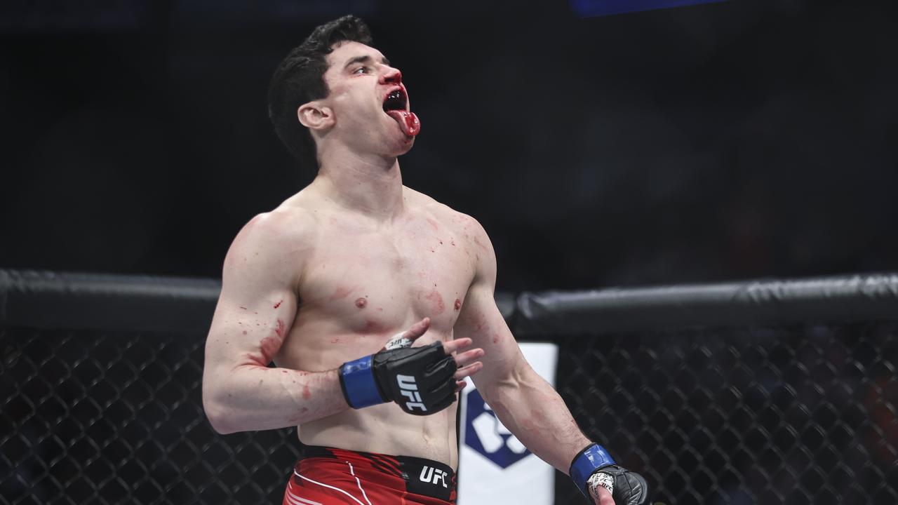 Mike Malott of Canada reacts after defeating Mickey Gall in a welterweight bout. James Gilbert/Getty Images/AFP