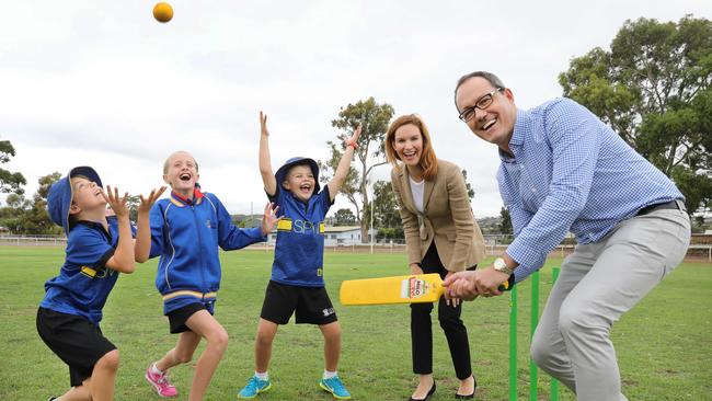 BIG HIT: Corey Wingard and Liberal candidate Carolyn Habib play cricket at Marion Sports Centre. <span id="U633290124211PaF" style="font-family:'Guardian Sans Regular';font-weight:normal;font-style:normal;">Picture: </span>AAP Image/Dean Martin