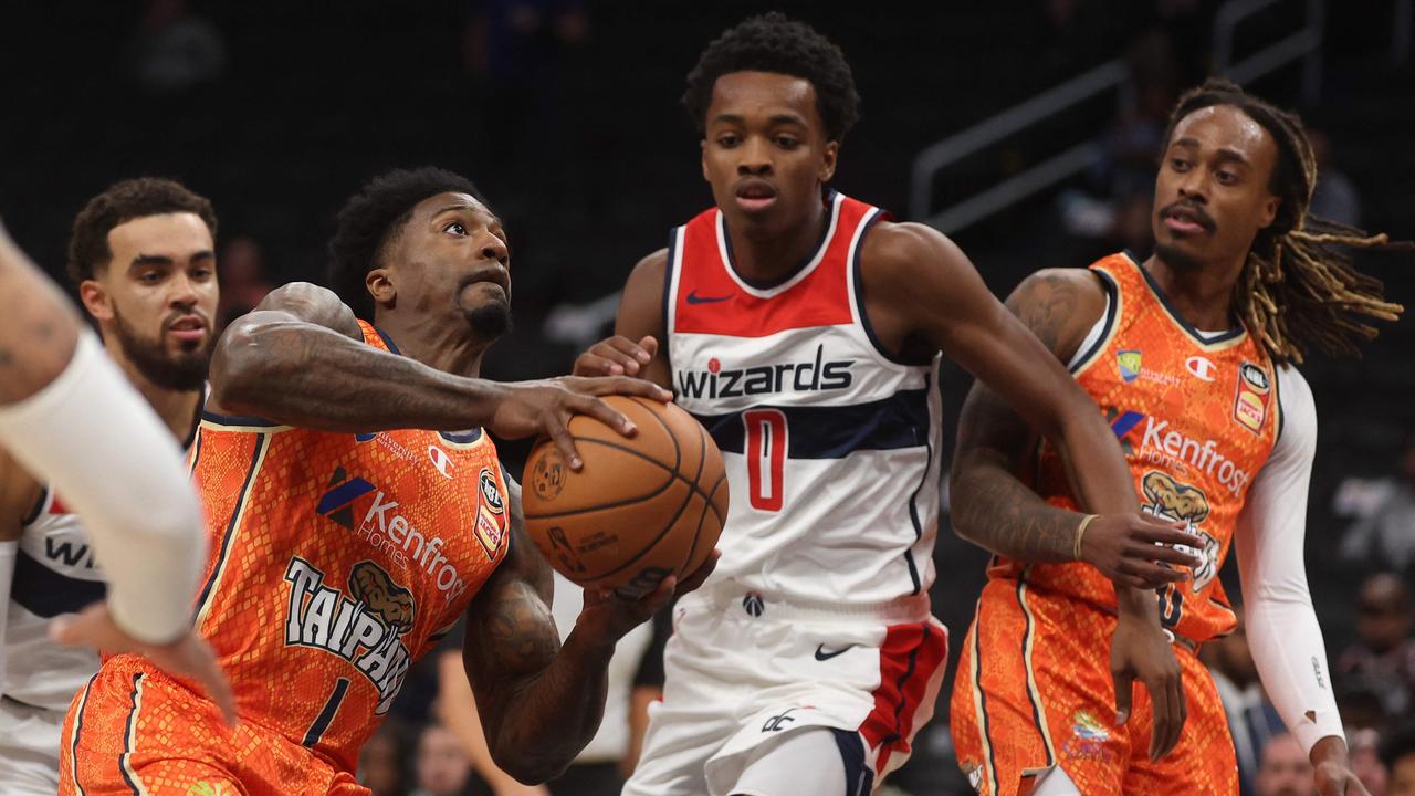 Patrick Miller drives past Washington Bilal Coulibaly. Picture: Patrick Smith/Getty Images/AFP