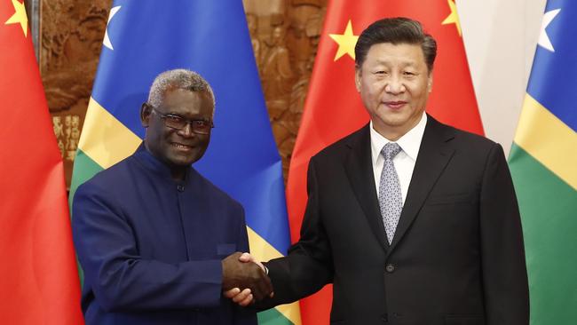 Chinese President Xi Jinping, right, with Prime Minister Manasseh Sogavare of the Solomon Islands. Picture: Getty Images