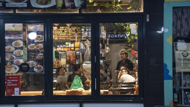 Diners enjoy a meal at Time for Thai on King Street, Newtown last night. Picture: Gordon McComiskie