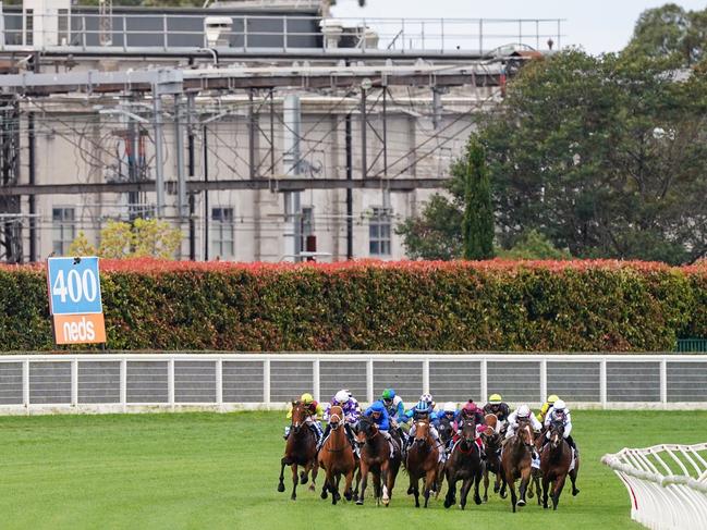 Horses round the home turn during the Keno Northwood Plume Stakes at Caulfield.