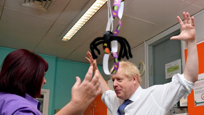 Boris Johnson speaks with chief nurse Nicola Burns-Muir at Milton Keynes University Hospital. Picture: AFP