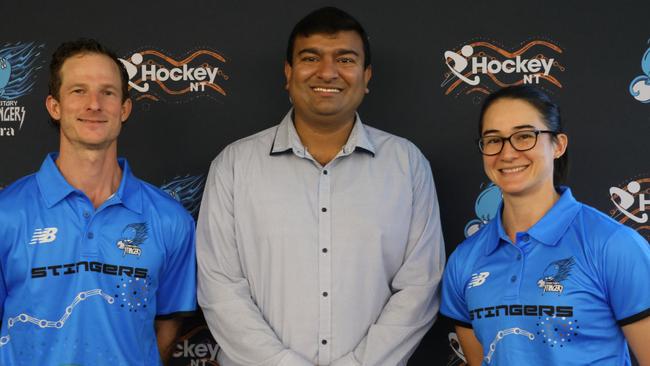 NT Sport Minister Jinson Charls with Territory Stingers players Adrian Lockley and Elizabeth Duguid.