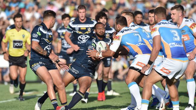 Titans players aim up in defence.
