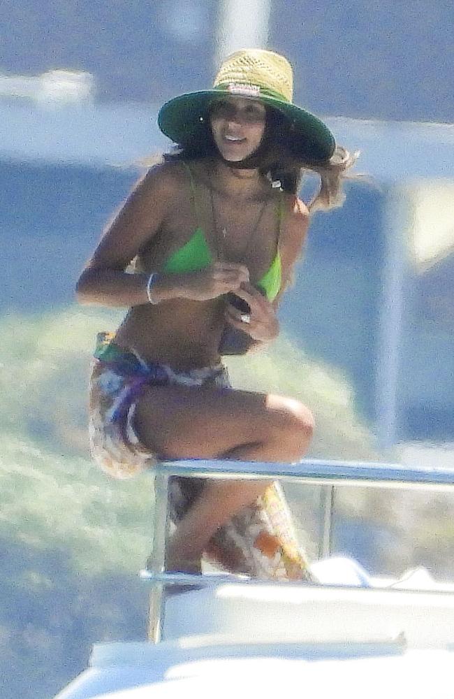 Pia Whitesell wore $7 Bunnings straw hat as she sailed around Sydney Harbour on New Year’s Day. Picture: ©MEDIA-MODE.COM
