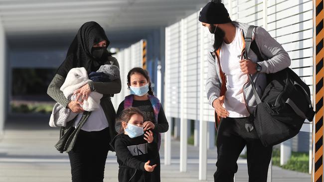 Richmond star Bachar Houli and his family arrive at Coolangatta to join his teammates in the AFL bubble in Queensland. Picture: Adam Head.