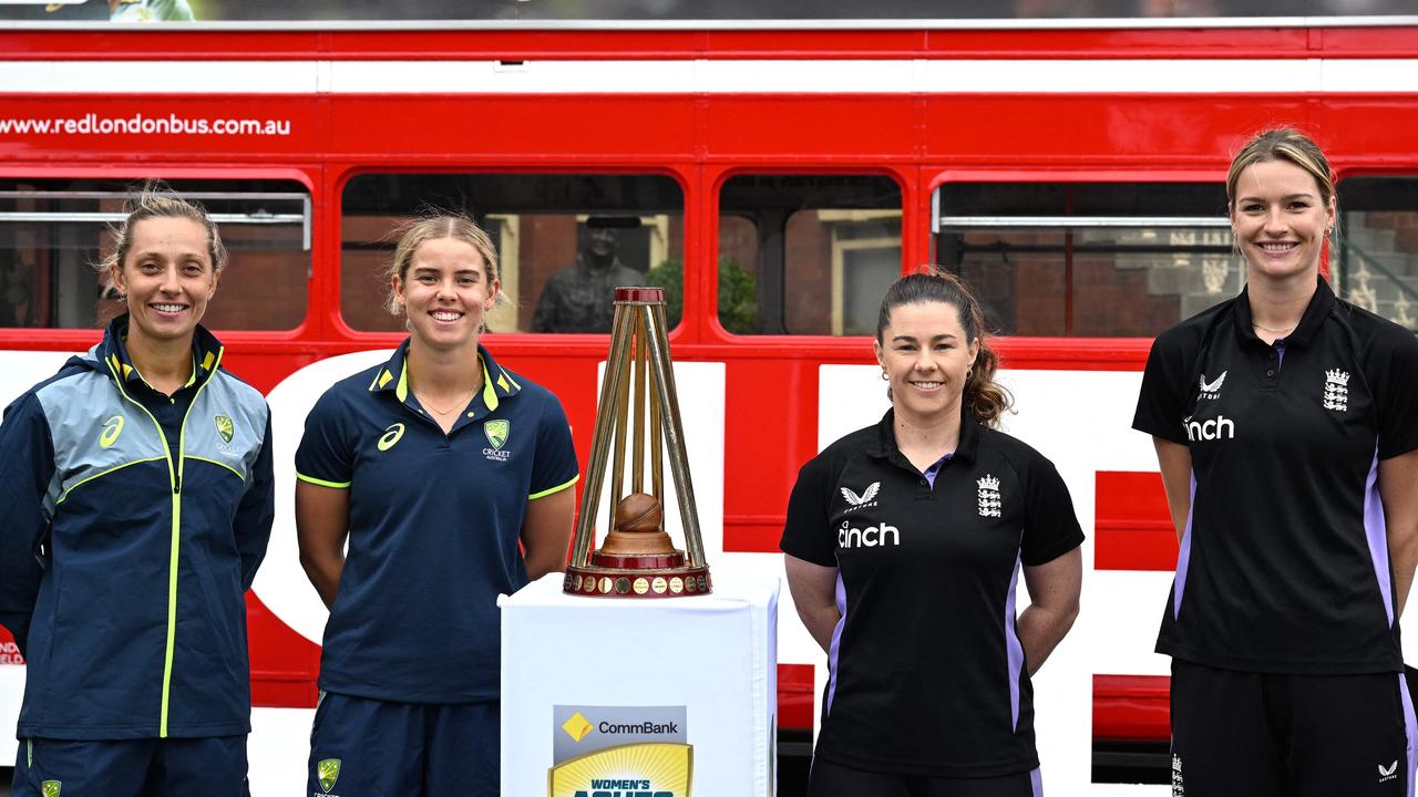 Australian players Ash Gardner and Phoebe Litchfield alongside England’s Tammy Beaumont and Lauren Bell at the SCG. Picture: Saeed Khan / AFP