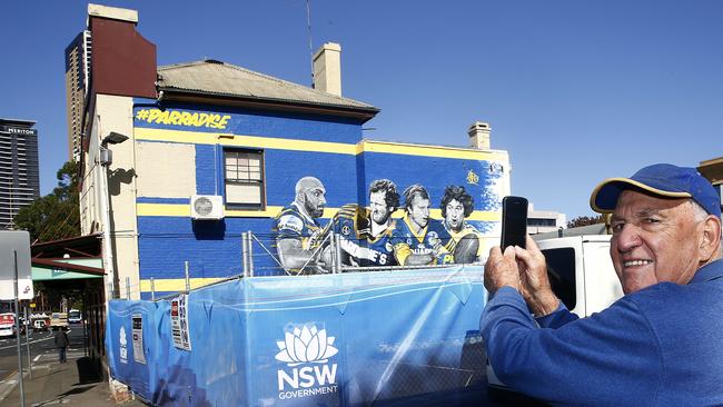 Phil Russo snaps some photos of the Royal Oak and its mural weeks before it was bulldozed. Picture: John Appleyard