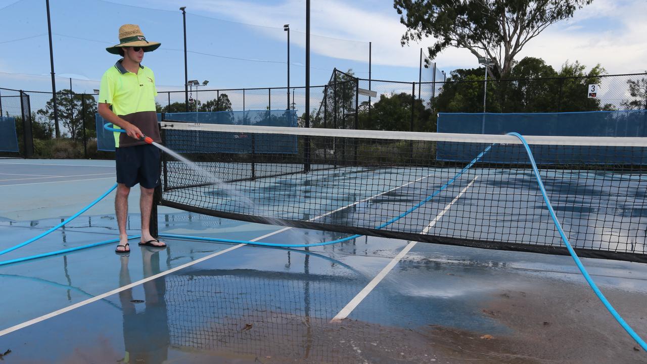 Flood water and Clean up at KDV Sport at Carrara. Pic Mike Batterham