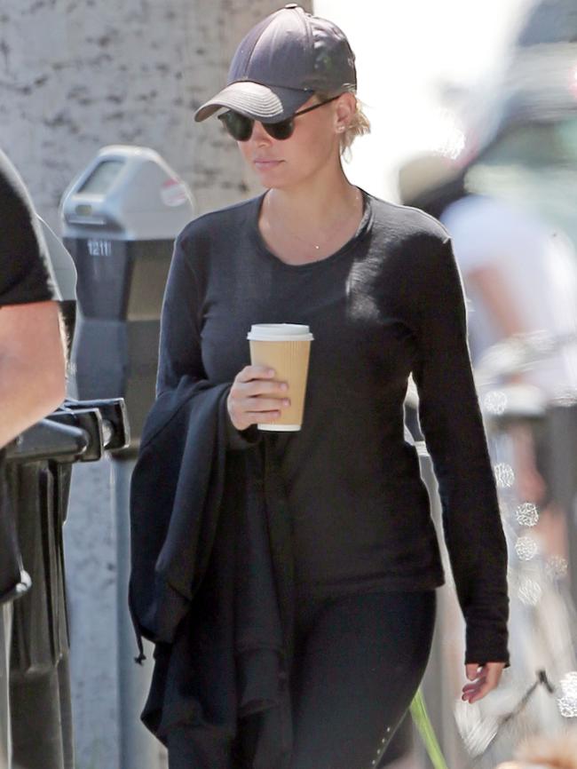 A relaxed looking Lara enjoyed a coffee. Picture: Pacific Coast News/australscope