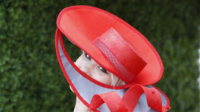 Myer Fashions on the Field entrant Liilia Lehtsaar wearing a hat by Georgia Skelton millinery. Picture: David Caird