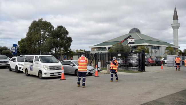 People queue at a Covid testing centre in Truganina. Picture: Andrew Henshaw