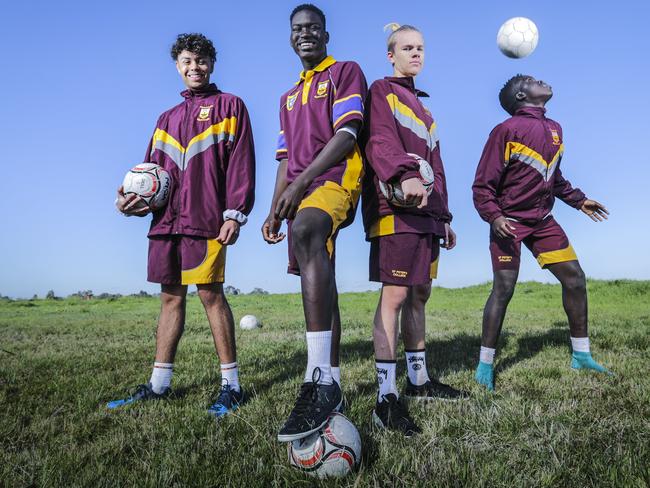 Young soccer fans (from left) Tejay Lebon, Ronaldo Onen, Jacob Noorbergen and Bowar Yamum at Casey Fields, the proposed site for an elite soccer facility. Picture: AAP