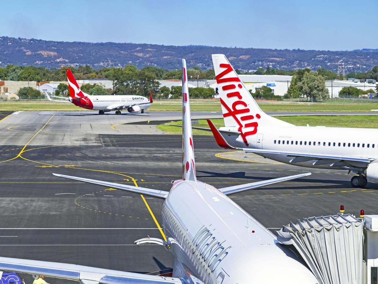 Planes from rivals Qantas and Virgin at Adelaide airport