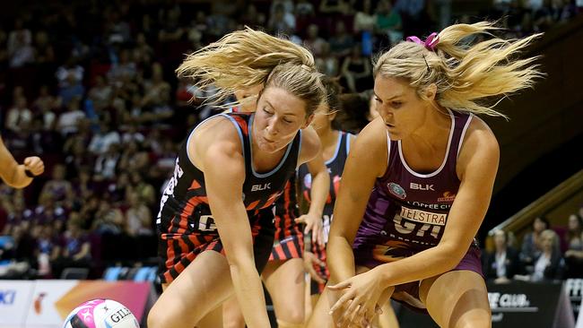 A tough contest for the ball in Firebirds v Mainland Tactix. .