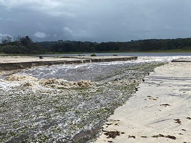 Tallow Creek naturally opening into the ocean at Suffolk Park. Picture: Byron Shire Council