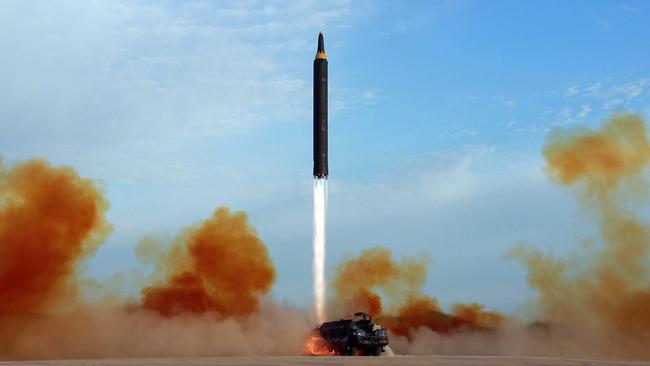 The North Korean government test-launches an intermediate range Hwasong-12 ballistic missile. Picture: Korean Central News Agency/Korea News Service via AP