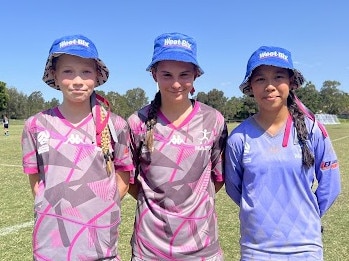 Football NT's Imogen Baldwin, Sophia Karanikolas and Hunter Ta at the 2024 Premier Invitational junior soccer tournament on the Gold Coast. Picture: Grace Hamilton.