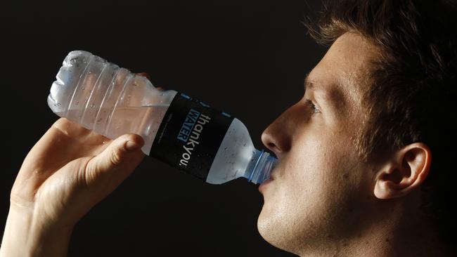 Where it all began: Daniel Flynn knocks back his bottled water. Picture: Mark Stewart