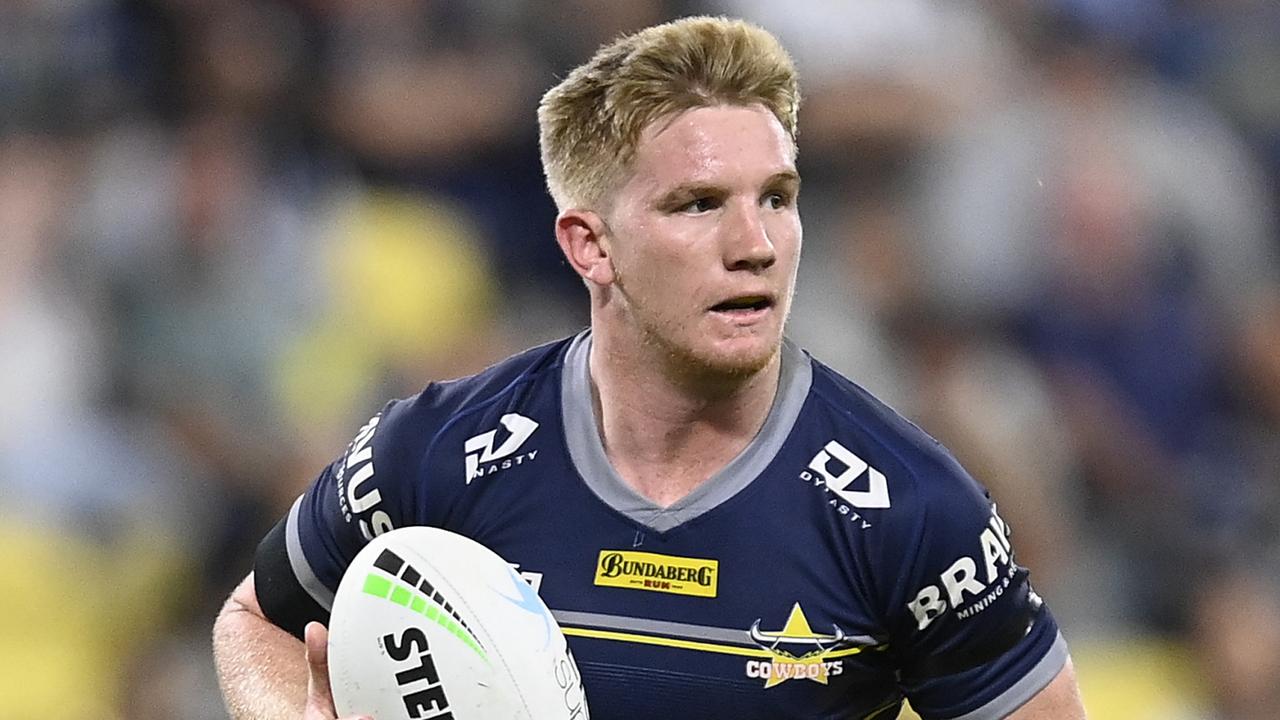 TOWNSVILLE, AUSTRALIA - AUGUST 19: Tom Dearden of the Cowboys runs the ball during the round 23 NRL match between the North Queensland Cowboys and the New Zealand Warriors at Qld Country Bank Stadium, on August 19, 2022, in Townsville, Australia. (Photo by Ian Hitchcock/Getty Images)