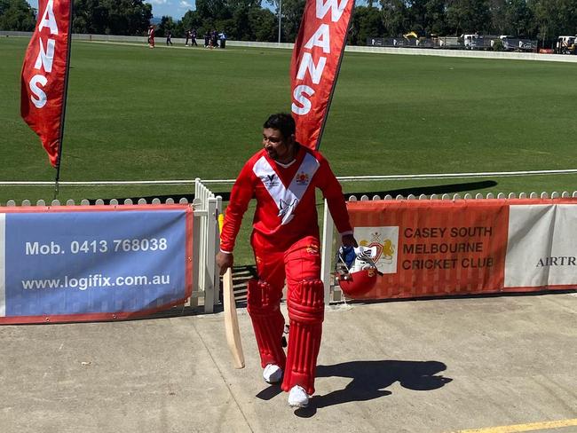 Tillakaratne Dilshan walks off after his half-century.