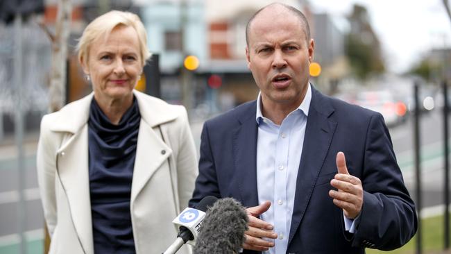 Treasurer Josh Frydenberg and MP Katie Allen in Melbourne on Sunday. Picture: David Geraghty