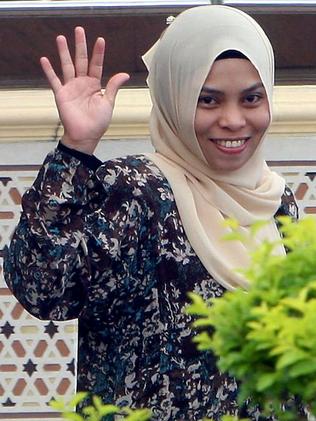 A relieved Kartika Sari Dewi Shukarno is released from prison after escaping a sentence for caning after the hospital worker was found guilty of drinking beer in a bar. Picture: AFP