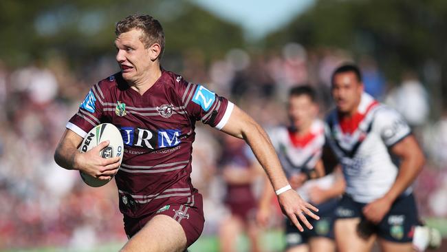 Manly's Tom Trbojevic scores during NRL match Manly Sea Eagles v Sydney Roosters at Brookvale oval. Picture. Phil Hillyard