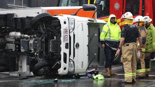 Emergency services at the scene of the truck rollover in Fortitude Valley. Picture: Liam Kidston