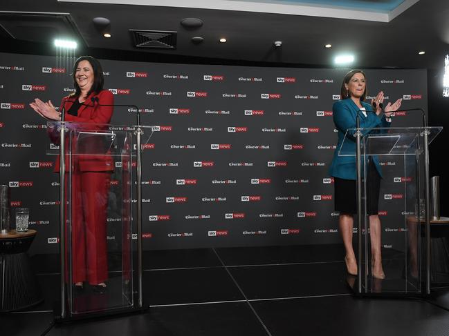 Premier Annastacia Palaszczuk (left) and Opposition Leader Deb Frecklington clap at the conclusion of the Sky News-Courier-Mail People's Forum at the Broncos Leagues Club. Picture: Dan Peled/NCA NewsWire