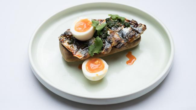 Wood fired sardines on toast, chimichurii, soft boiled eggs, paprika. Beaux Rumble, Fortitude Valley