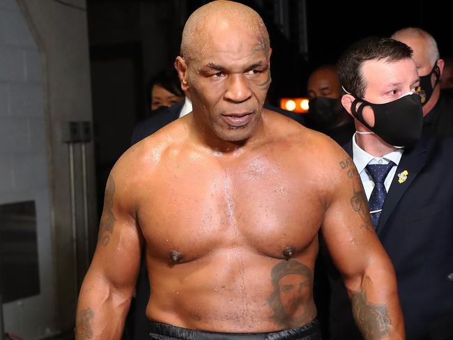 TOPSHOT - LOS ANGELES, CALIFORNIA - NOVEMBER 28: Mike Tyson exits the ring after receiving a split draw against Roy Jones Jr. during Mike Tyson vs Roy Jones Jr. presented by Triller at Staples Center on November 28, 2020 in Los Angeles, California.   Joe Scarnici/Getty Images for Triller/AFP (Photo by Joe Scarnici / GETTY IMAGES NORTH AMERICA / AFP)