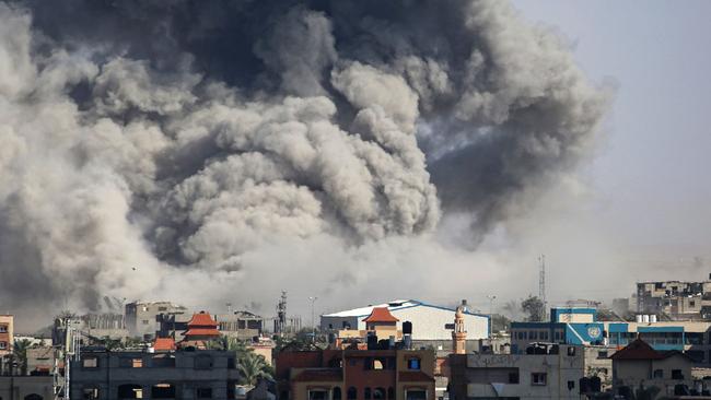 Smoke billows over the southern Gaza city of Rafah following Israeli air strikes on up to 50 Hamas targets in the densely populated region. Picture: AFP