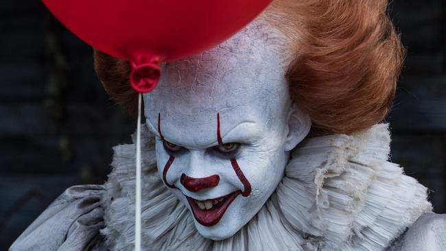 Pennywise the Clown (Bill Skarsgard) in a scene from Stephen King's It. Roadshow Films.