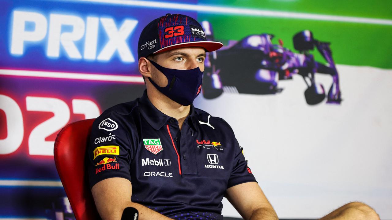 Red Bull's Dutch driver Max Verstappen gives a press conference ahead of the Abu Dhabi Formula One Grand Prix at the Yas Marina Circuit in the Emirati city of Abu Dhabi on December 9, 2021. (Photo by Antonin Vincent / POOL / AFP)
