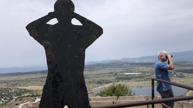 A man looks out over Syria from Mount Bental next to the Syrian border on May 10 after  20 rockets were fired at Israeli military bases by Iranian forces from southern Syria just after midnight on Thursday (Pic: Lior Mizrahi/Getty)