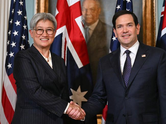 US Secretary of State Marco Rubio and Australian Foreign Minister Penny Wong shake hands as they meet at the State Department in Washington, DC, on January 21, 2025. (Photo by ANDREW CABALLERO-REYNOLDS / AFP)